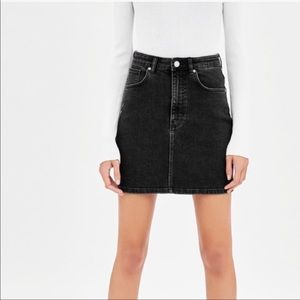 Black denim mini skirt